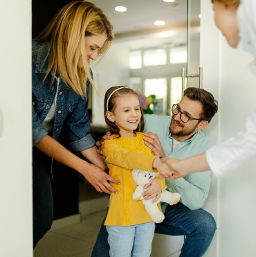 Tummarello & Pandak <br>Family Dentistry happy family meeting a dentist